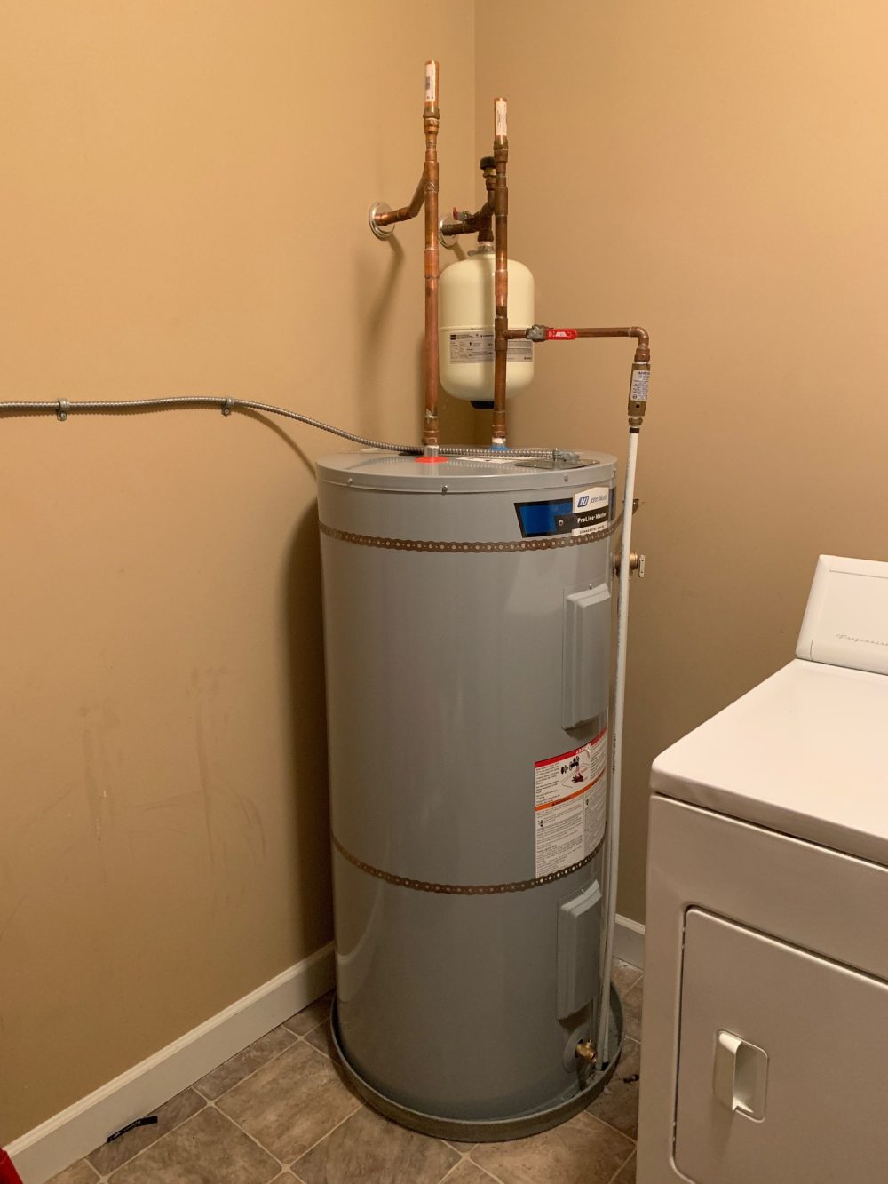 Residential electric water heater replacement