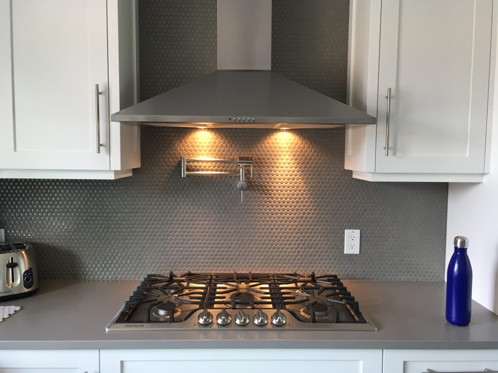 Gas cooktop with pot filler